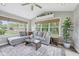 Cozy living room with large windows, comfortable seating, and stylish decor at 3571 S Cedar Creek Ln, New Palestine, IN 46163
