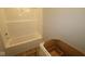 Unfinished bathroom featuring a white tub/shower combo and a vanity area, ready for personalization at 4141 Barrel Ln, Westfield, IN 46062