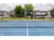 Community playground and tennis court in a well-maintained common area of the neighborhood at 4353 W Parkway Ct, New Palestine, IN 46163