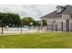 Community pool area featuring ample seating and a well-maintained pool house for residents at 4353 W Parkway Ct, New Palestine, IN 46163