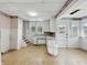 Kitchen featuring a white cabinets, double sink and lots of natural light at 4709 E New York St, Indianapolis, IN 46201