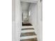 Stairwell leading to the upper level at 4709 E New York St, Indianapolis, IN 46201