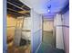 Basement view featuring a laundry sink and a painted concrete floor at 4715 E New York St, Indianapolis, IN 46201