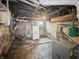 Basement interior with water pipes, furnace, and electrical box visible, showing utilities at 4715 E New York St, Indianapolis, IN 46201