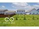 Expansive backyard with lush green grass extending to the horizon at 4726 Amber Wood Ln, Indianapolis, IN 46235