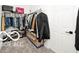 Walk-in closet with custom shelving, hanging racks, and ample storage space at 4726 Amber Wood Ln, Indianapolis, IN 46235