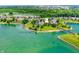 Expansive aerial perspective showcasing a waterfront community with private boat docks and mature trees at 4810 Crystal River Ct, Indianapolis, IN 46240