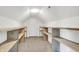 Attic closet space with built-in shelving for optimal storage and organization at 4810 Crystal River Ct, Indianapolis, IN 46240