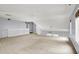 Bright open loft space with carpeted floors, white railing and plenty of natural light at 4810 Crystal River Ct, Indianapolis, IN 46240