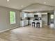 View of the kitchen featuring white cabinets and stainless steel appliances at 5 Watson Dr, Trafalgar, IN 46181
