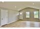 Living room featuring high ceilings, recessed lighting and luxury vinyl plank flooring at 5 Watson Dr, Trafalgar, IN 46181
