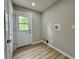 A mudroom that features vinyl floors and utility hookups at 5 Watson Dr, Trafalgar, IN 46181