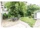 Spacious backyard with patio, garden, and lush greenery at 5119 Norwaldo Ave, Indianapolis, IN 46205