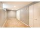 Unfinished basement with carpet, white doors, and neutral walls ready for customization at 5119 Norwaldo Ave, Indianapolis, IN 46205