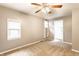 Spacious bedroom features neutral carpet, light gray walls, and natural light at 5119 Norwaldo Ave, Indianapolis, IN 46205