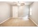 Clean, bright bedroom features a ceiling fan and neutral carpet at 5119 Norwaldo Ave, Indianapolis, IN 46205
