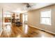 Open concept living and dining area with beautiful hardwood floors at 5119 Norwaldo Ave, Indianapolis, IN 46205