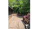 Wooden back deck with trees in the background at 5530 Shawnee Trail South Dr, Indianapolis, IN 46220