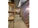 Basement with storage shelves and space for a work area at 5530 Shawnee Trail South Dr, Indianapolis, IN 46220