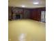 Basement with wooden walls and a fireplace at 5530 Shawnee Trail South Dr, Indianapolis, IN 46220