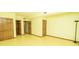 Large bonus room with multiple closets and neutral paint is a flexible space for any need at 5530 Shawnee Trail South Dr, Indianapolis, IN 46220