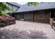 Expansive wood deck is perfect for outdoor entertaining and relaxing with mature landscaping and lots of space at 5530 Shawnee Trail South Dr, Indianapolis, IN 46220