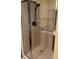 Shower stall with silver frame and hand rail at 5530 Shawnee Trail South Dr, Indianapolis, IN 46220