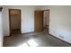 Spacious bedroom with multiple doorways, neutral paint, and plenty of room at 5632 Spring Mist Cir, Indianapolis, IN 46237