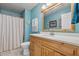 Bathroom featuring a wooden vanity, white countertop, and updated sink at 5824 Wesley Rdg, Martinsville, IN 46151