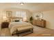Cozy bedroom features a comfortable bed, modern dresser, and soft natural light at 5824 Wesley Rdg, Martinsville, IN 46151
