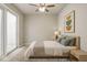 Tranquil bedroom with a sliding glass door, minimalist design, and natural light at 5824 Wesley Rdg, Martinsville, IN 46151