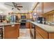 A fully equipped kitchen featuring stainless steel appliances and granite countertops at 5824 Wesley Rdg, Martinsville, IN 46151