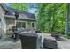 Spacious patio with comfortable seating, grill, and fire pit, perfect for entertaining at 5824 Wesley Rdg, Martinsville, IN 46151