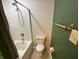 This is a full bathroom with a shower and tub combo, toilet and modern fixtures at 5850 Pennekamp Dr, Plainfield, IN 46168