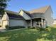 Charming home with well-manicured lawn and landscaping at 5850 Pennekamp Dr, Plainfield, IN 46168