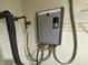 Close-up view of the efficient and modern tankless water heater system at 5850 Pennekamp Dr, Plainfield, IN 46168
