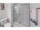 Bathroom featuring glass shower, toilet and sink at 59 Manchester Dr, Trafalgar, IN 46181