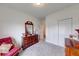 Neutral bedroom featuring carpet floors, and large closet at 59 Manchester Dr, Trafalgar, IN 46181