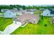 Beautiful single-story home with a well-manicured lawn and attached two car garage in a desirable neighborhood at 59 Manchester Dr, Trafalgar, IN 46181
