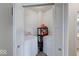 Convenient laundry room features washer, dryer, and shelving for storage at 59 Manchester Dr, Trafalgar, IN 46181