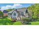 Aerial view of home with backyard, deck and lush landscaping at 5940 Chapmans Trl, Carmel, IN 46033