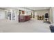 Finished basement with a wet bar, dining area, and workout area at 5940 Chapmans Trl, Carmel, IN 46033