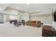 Finished basement featuring neutral carpet, recessed lighting, lounge area, and recreational space at 5940 Chapmans Trl, Carmel, IN 46033