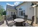 Outdoor deck featuring a fire pit table and chairs, perfect for relaxing at 5940 Chapmans Trl, Carmel, IN 46033