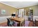 Inviting home office featuring a desk, chair, and bookshelf at 5940 Chapmans Trl, Carmel, IN 46033
