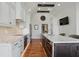 Gourmet kitchen features custom cabinets, island with marble countertops, and stainless steel appliances at 5940 Chapmans Trl, Carmel, IN 46033