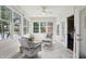 Relax in this sunroom with views of the water at 5940 Chapmans Trl, Carmel, IN 46033