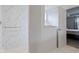 Bathroom showcasing a white marble-tiled shower and glass partition with a view into the bedroom at 6107 Flagler Ln, Brownsburg, IN 46112