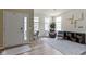 Inviting living room with abundant natural light, modern decor, and elegant chandelier at 6107 Flagler Ln, Brownsburg, IN 46112