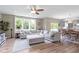 Open-concept living room offering a comfortable seating area and direct access to the kitchen and dining at 6107 Flagler Ln, Brownsburg, IN 46112